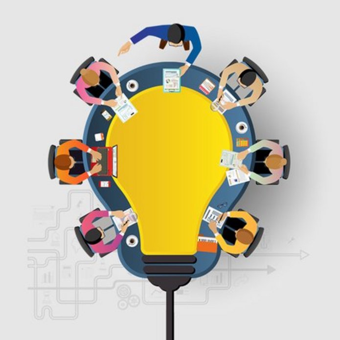 grafika IPMA XV, ludzie siedzący przy stole w kształcie żarówki