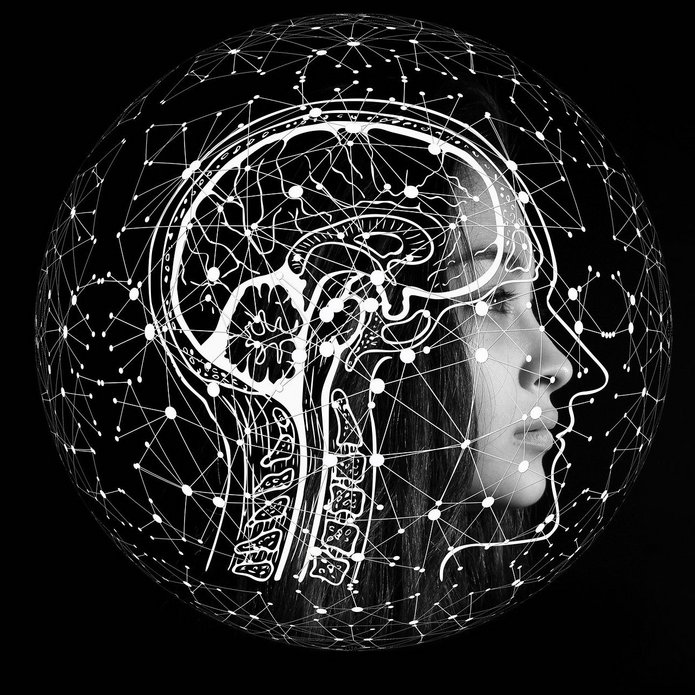 Visualization of the brain, a woman's face and a network of connected points around it