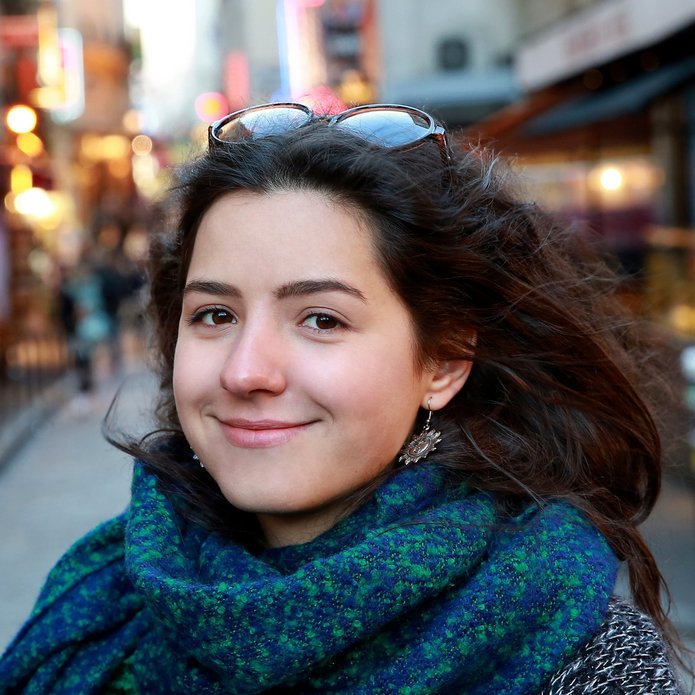 A decorative element: a portrait photo of a smiling woman