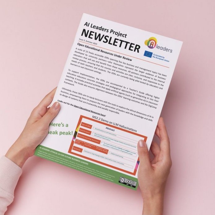 the newsletter held in somebody's hands