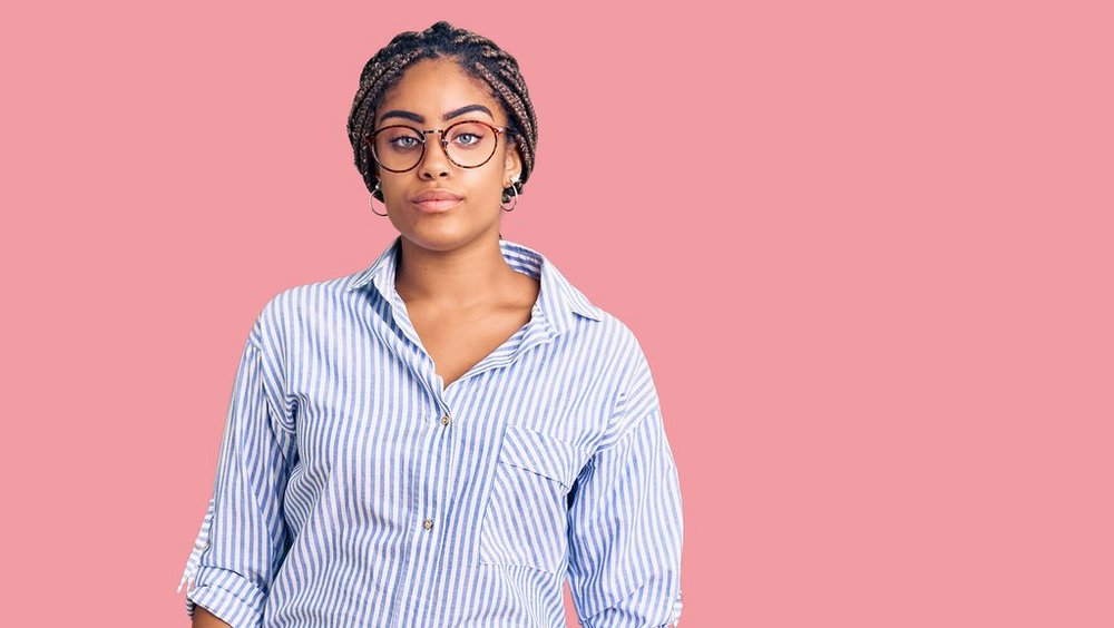 a decorative element depicting a young African American woman wearing glasses